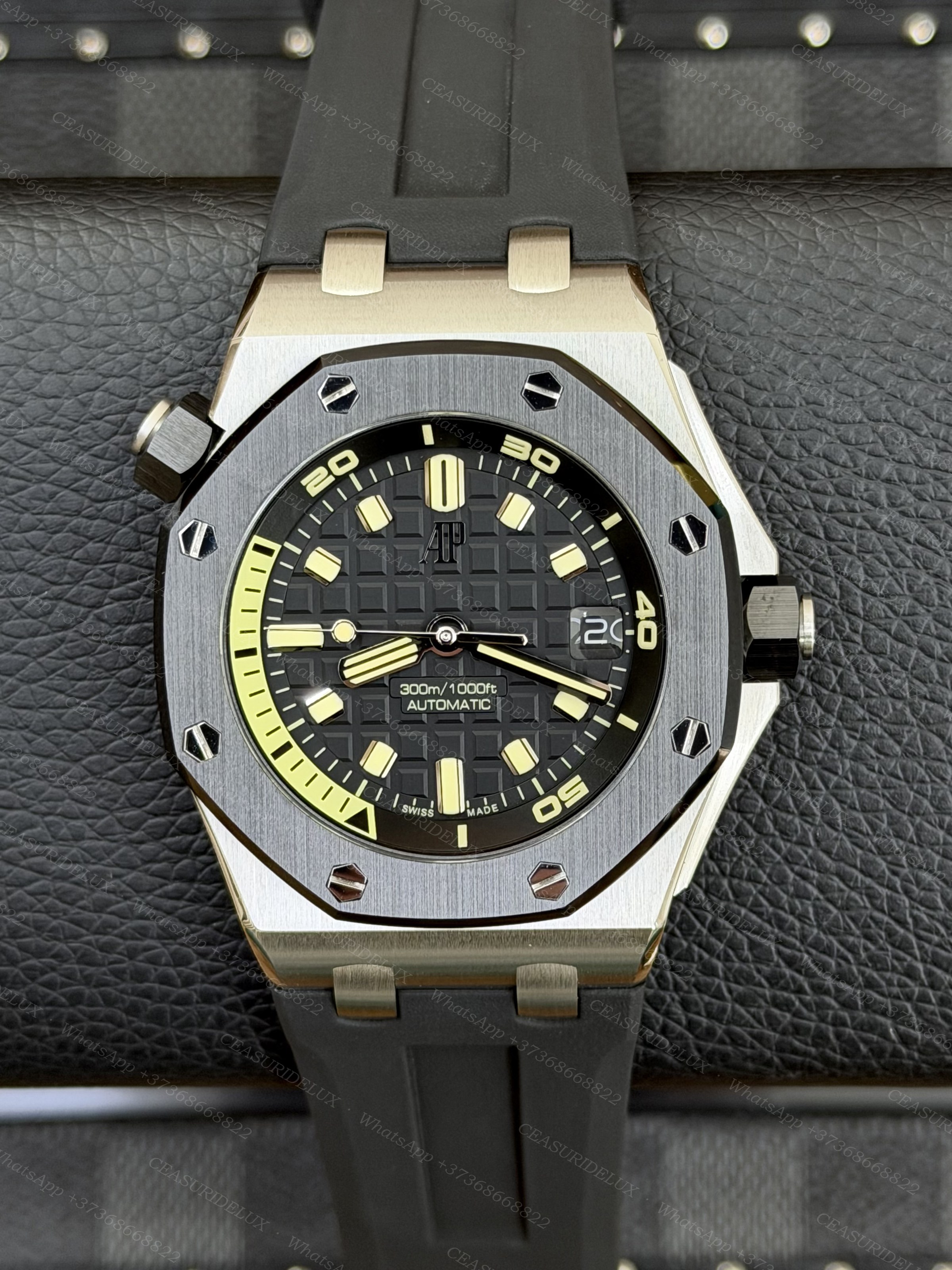 Audemars Piguet Royal Oak Offshore 42mm Diver Steel — Black Dial + Yellow Accents on Rubber (15710ST) Background