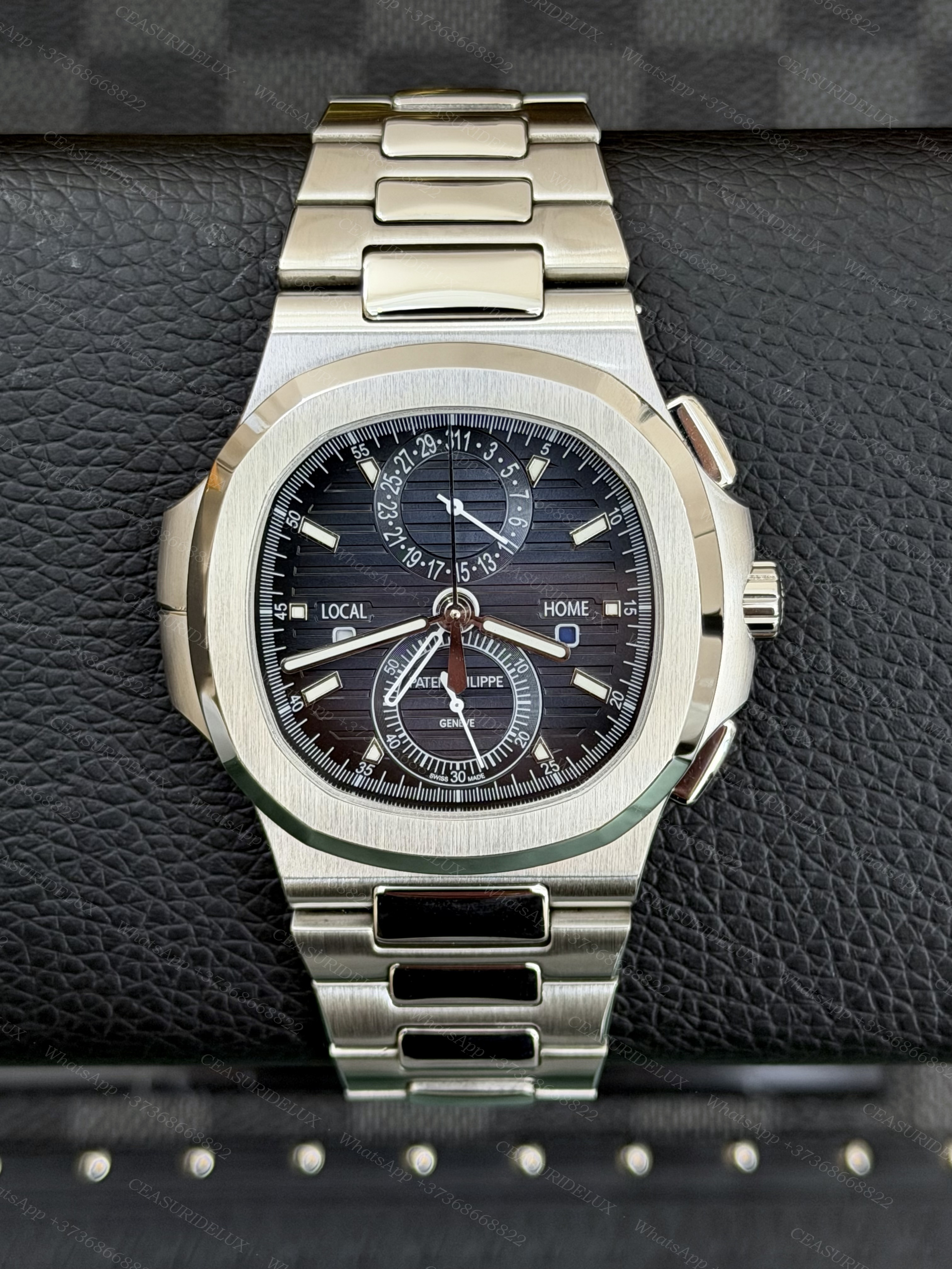 Patek Philippe Nautilus 5990/1A Steel — Black Dial Travel Time Chronograph
