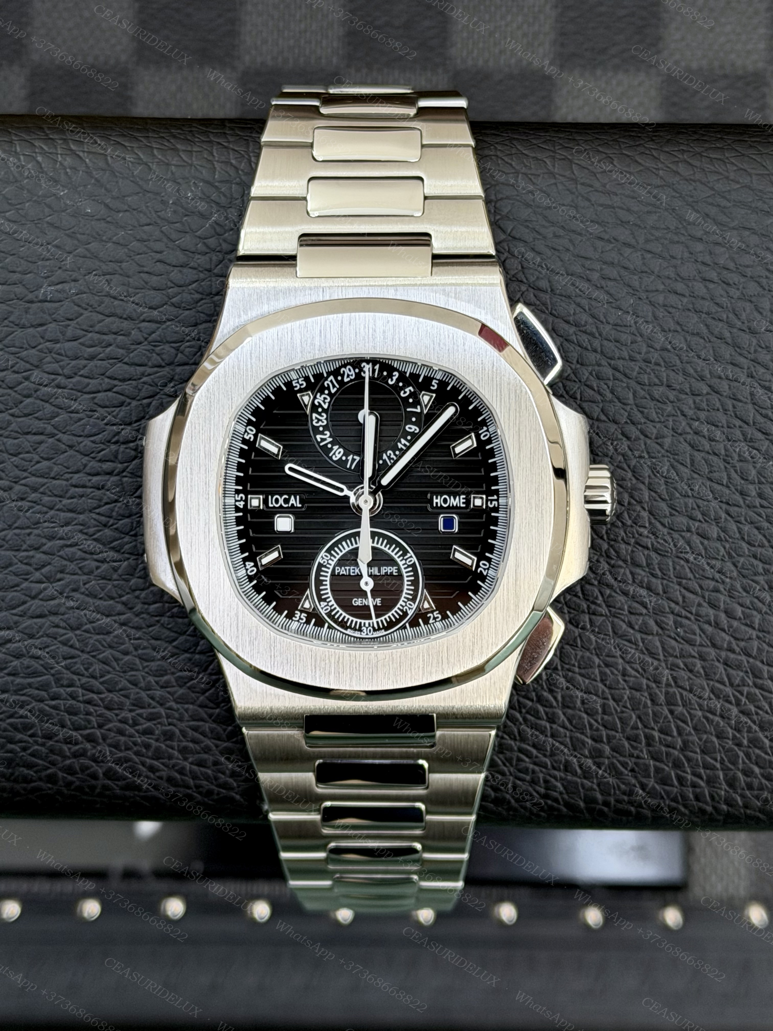 Patek Philippe Nautilus 5990/1A Steel — Black Dial Travel Time Chronograph