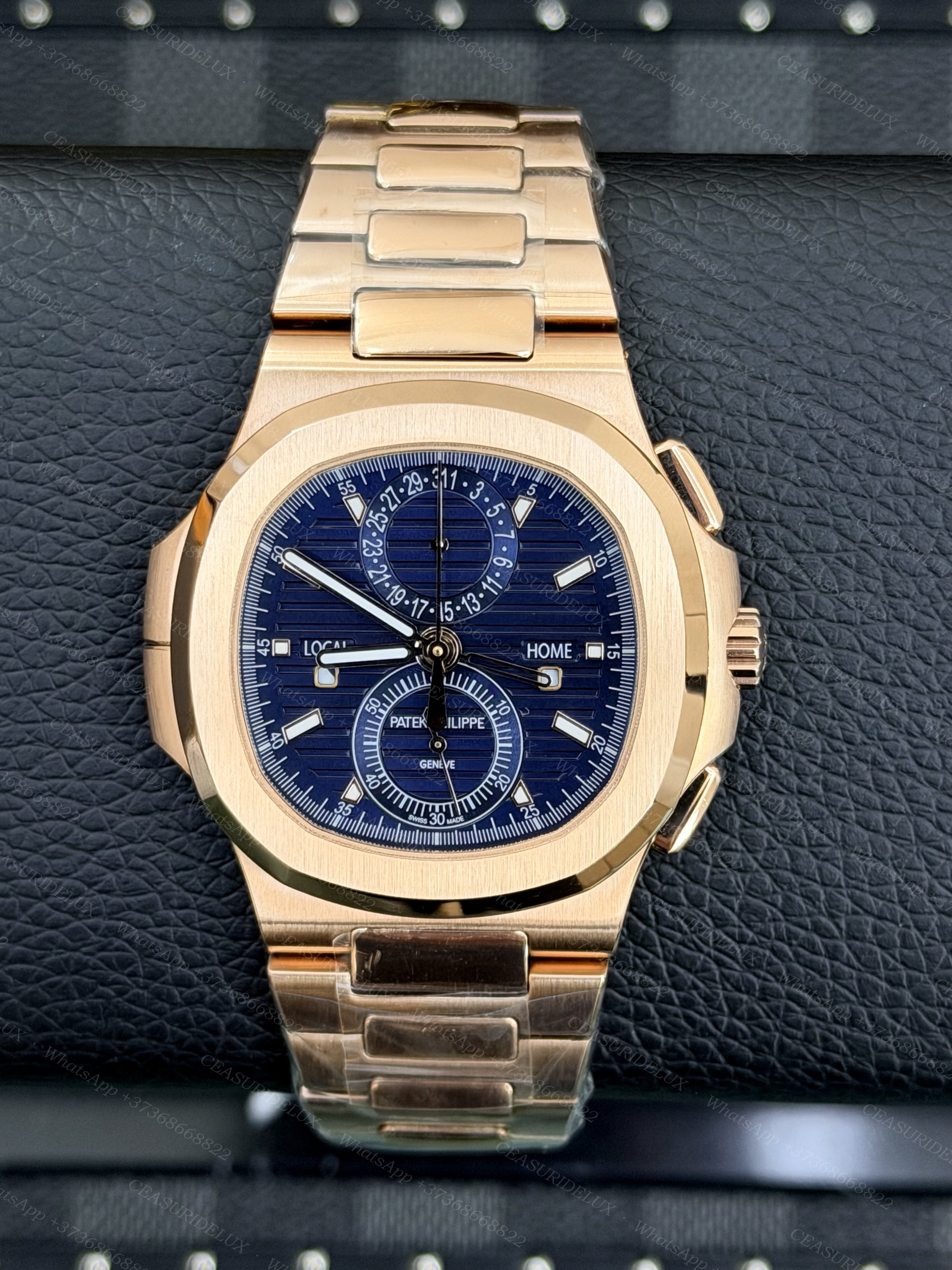 Patek Philippe Nautilus 5990/1R Rose Gold — Blue Dial Travel Time Chronograph