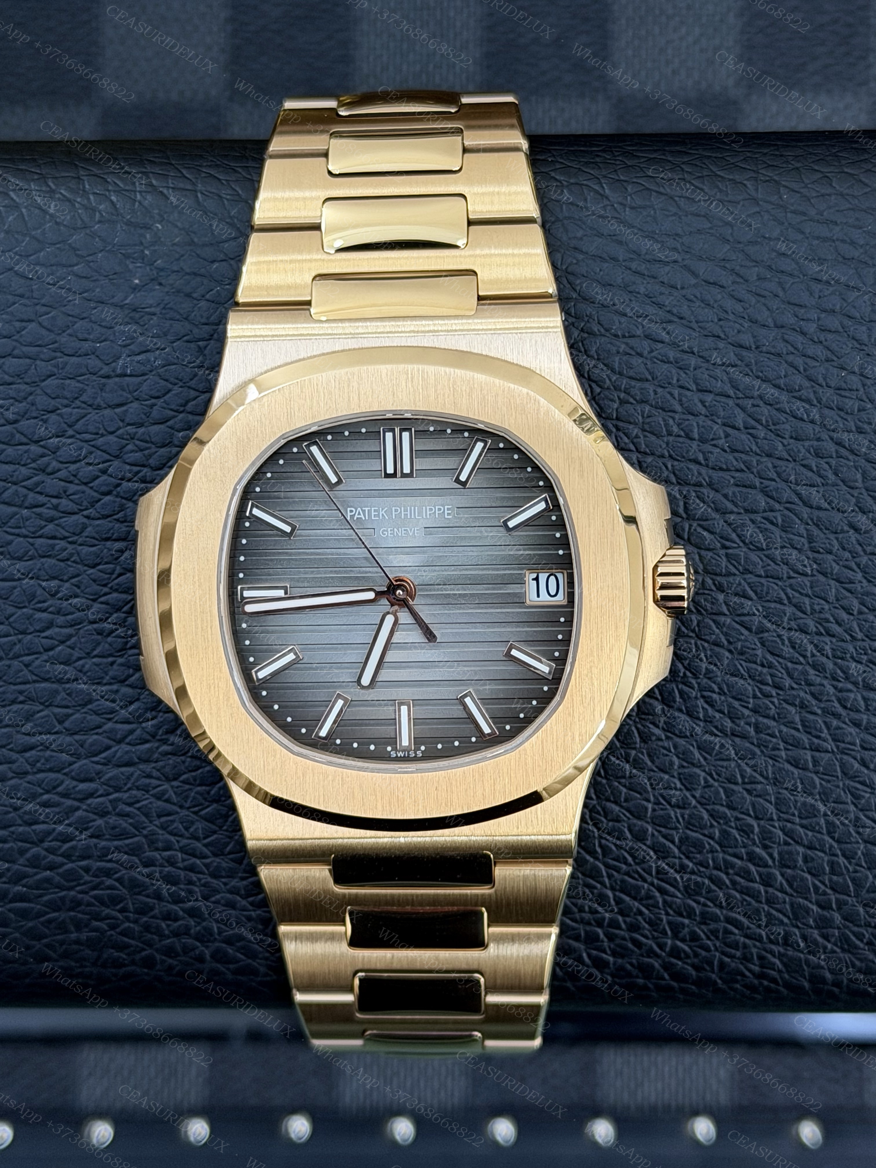 Patek Philippe Nautilus 5711/1J Yellow Gold — Grey Dial