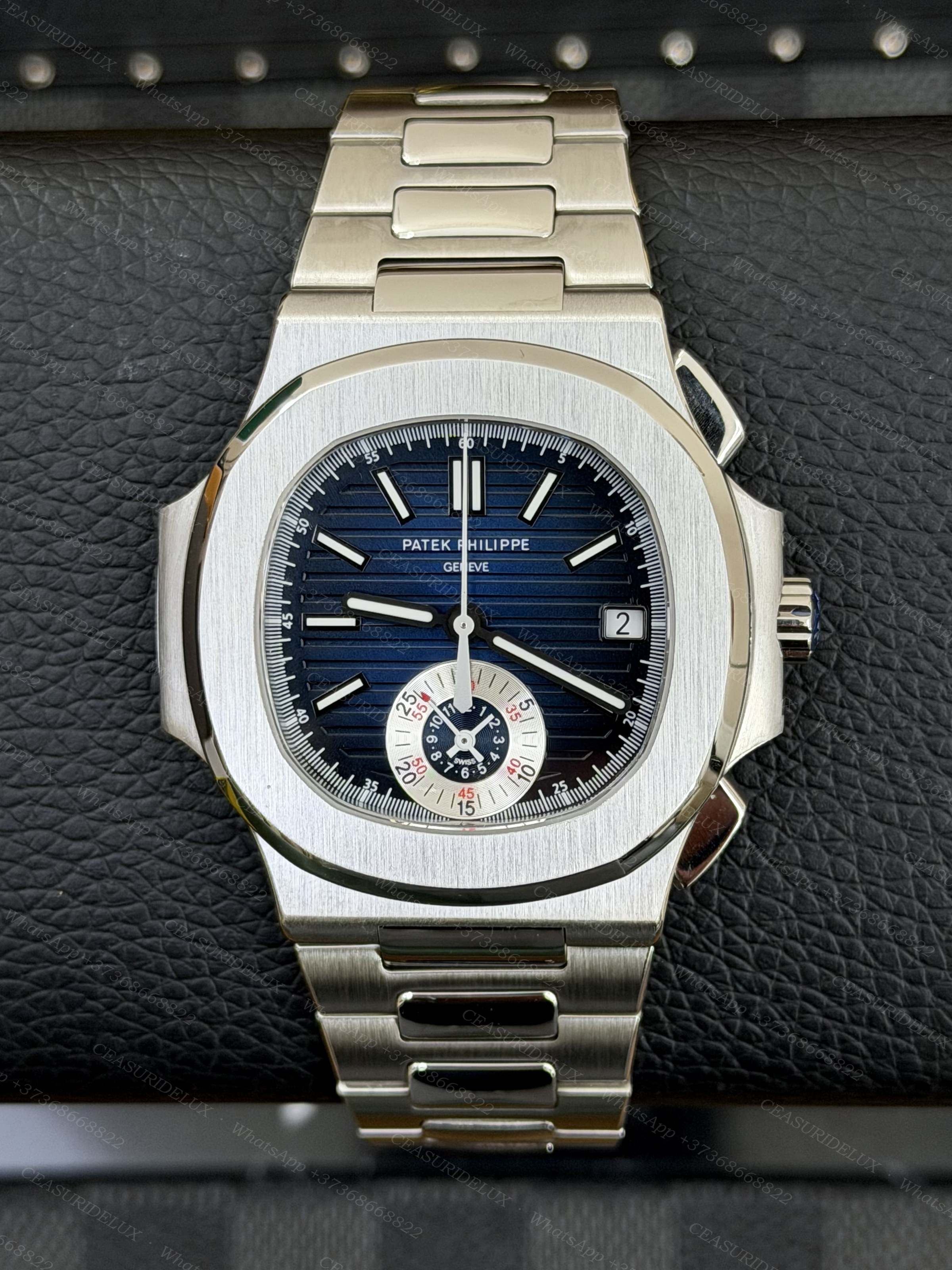 Patek Philippe Nautilus 5980/1A Steel — Blue Dial Chronograph Background