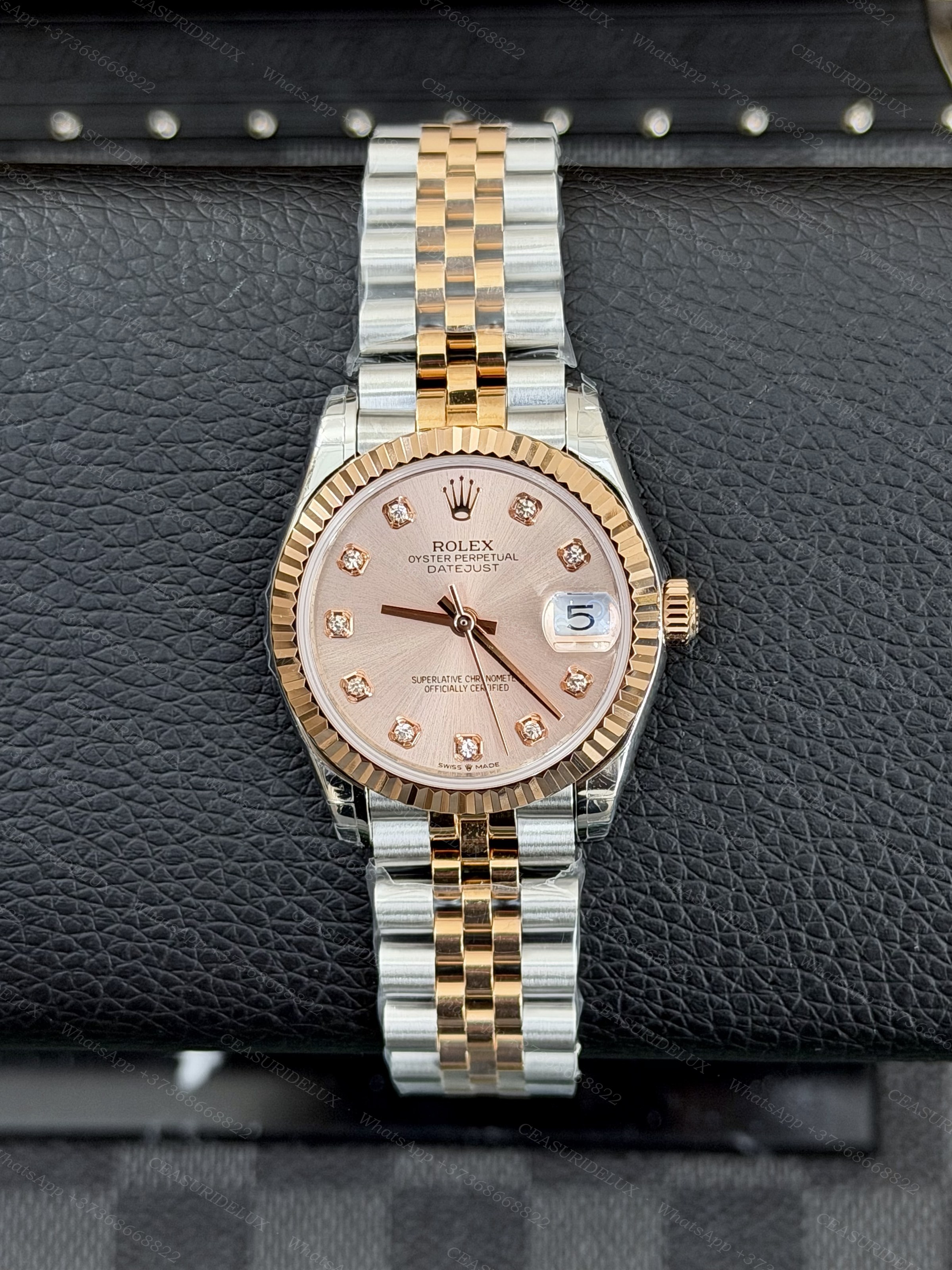 Rolex Datejust 31 Two-Tone Steel + Everose Gold — Pink Sundust Diamond Dial Background