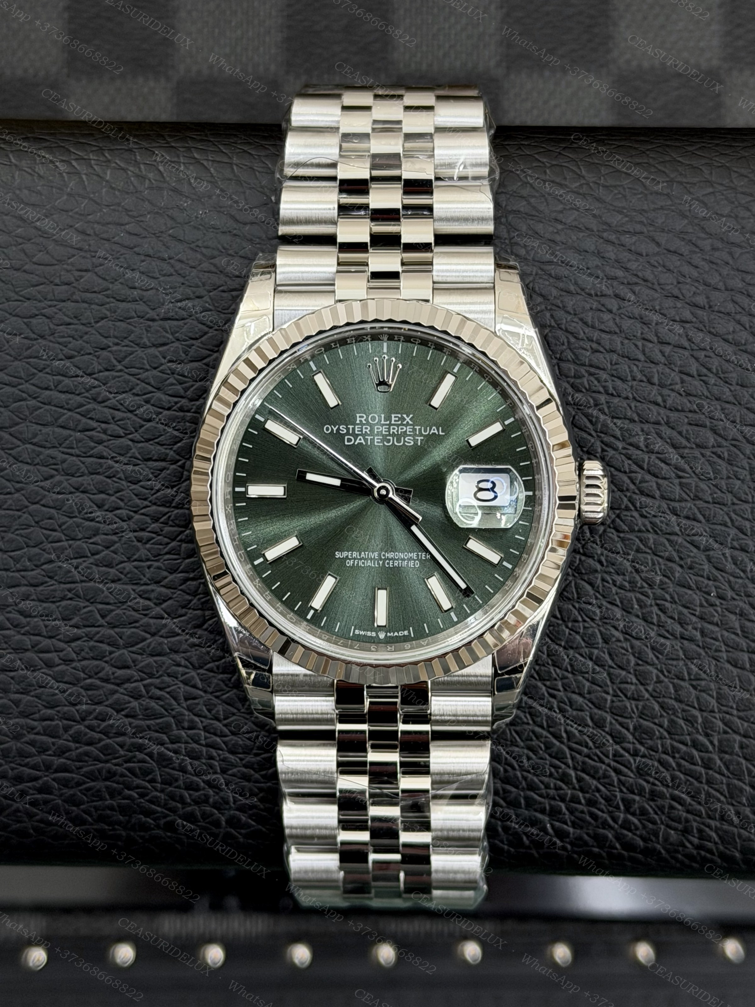 Rolex Date-Just 36 Steel/White Gold — Olive Green Dial + Jubilee (126234) Background