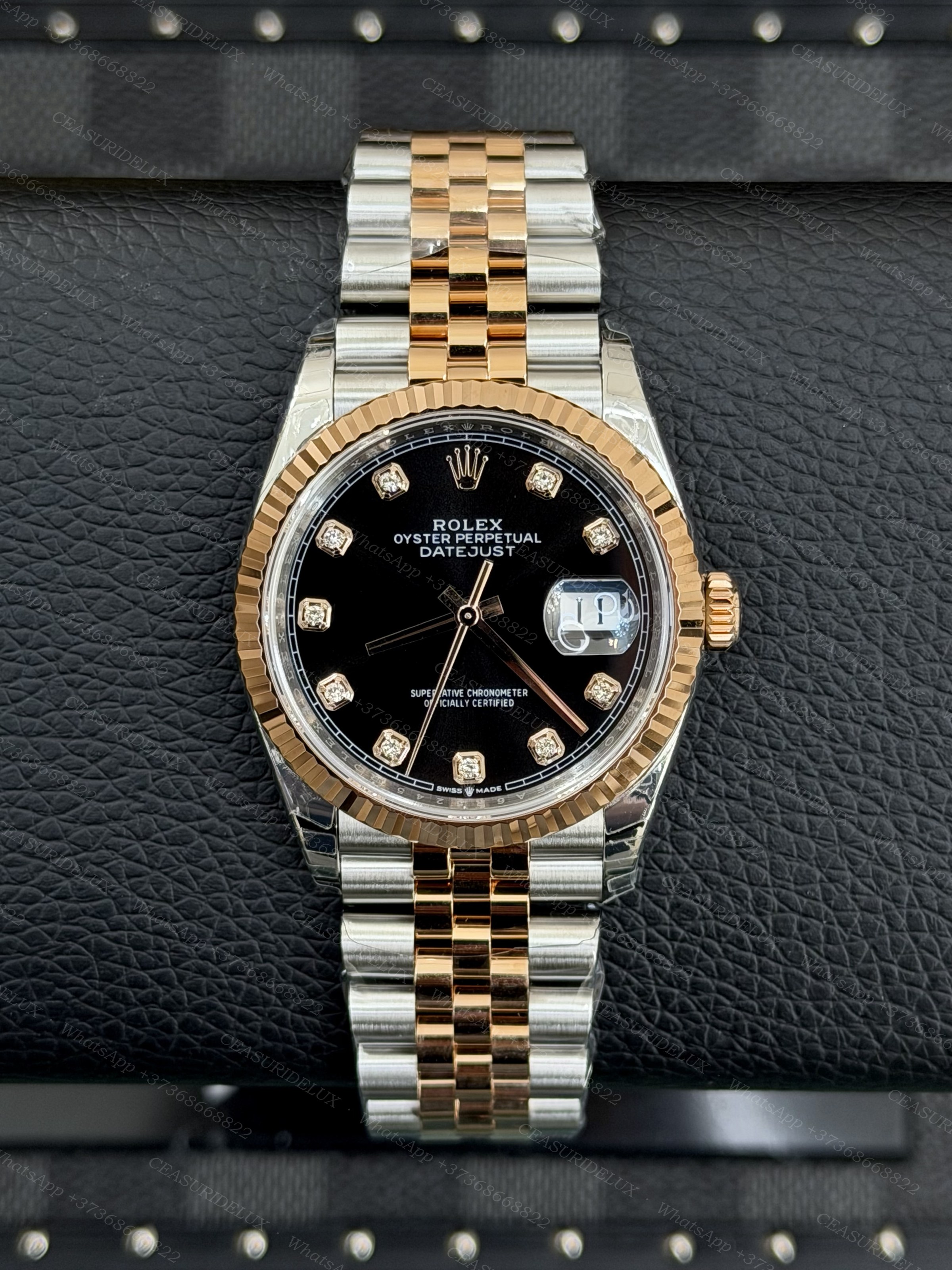 Rolex Date-Just 36 Two-Tone Steel/Everose Gold — Black Diamond Dial + Jubilee (126231) Background