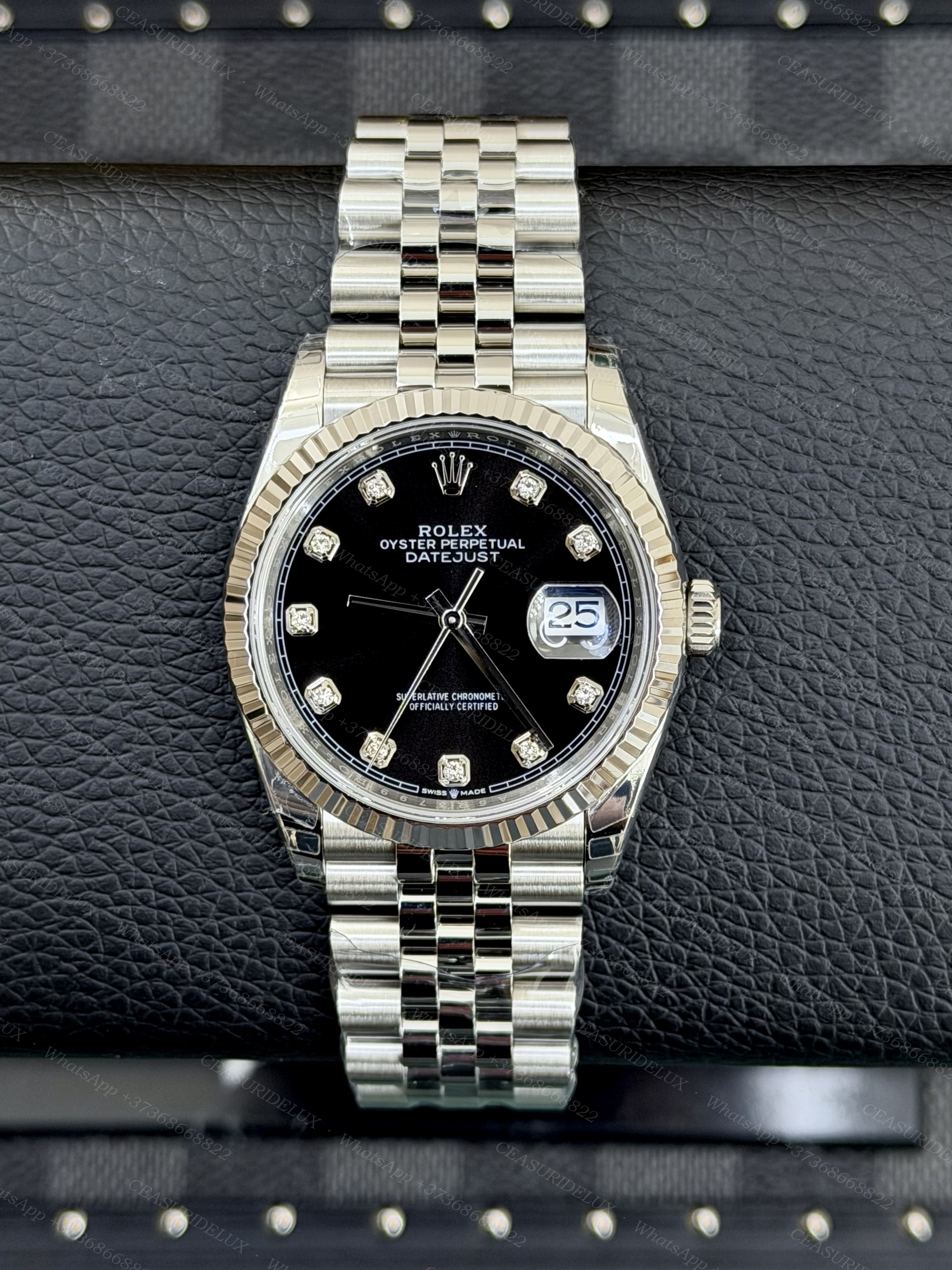 Rolex Datejust 36 Steel/White Gold — Black Diamond Dial + Jubilee (126234)