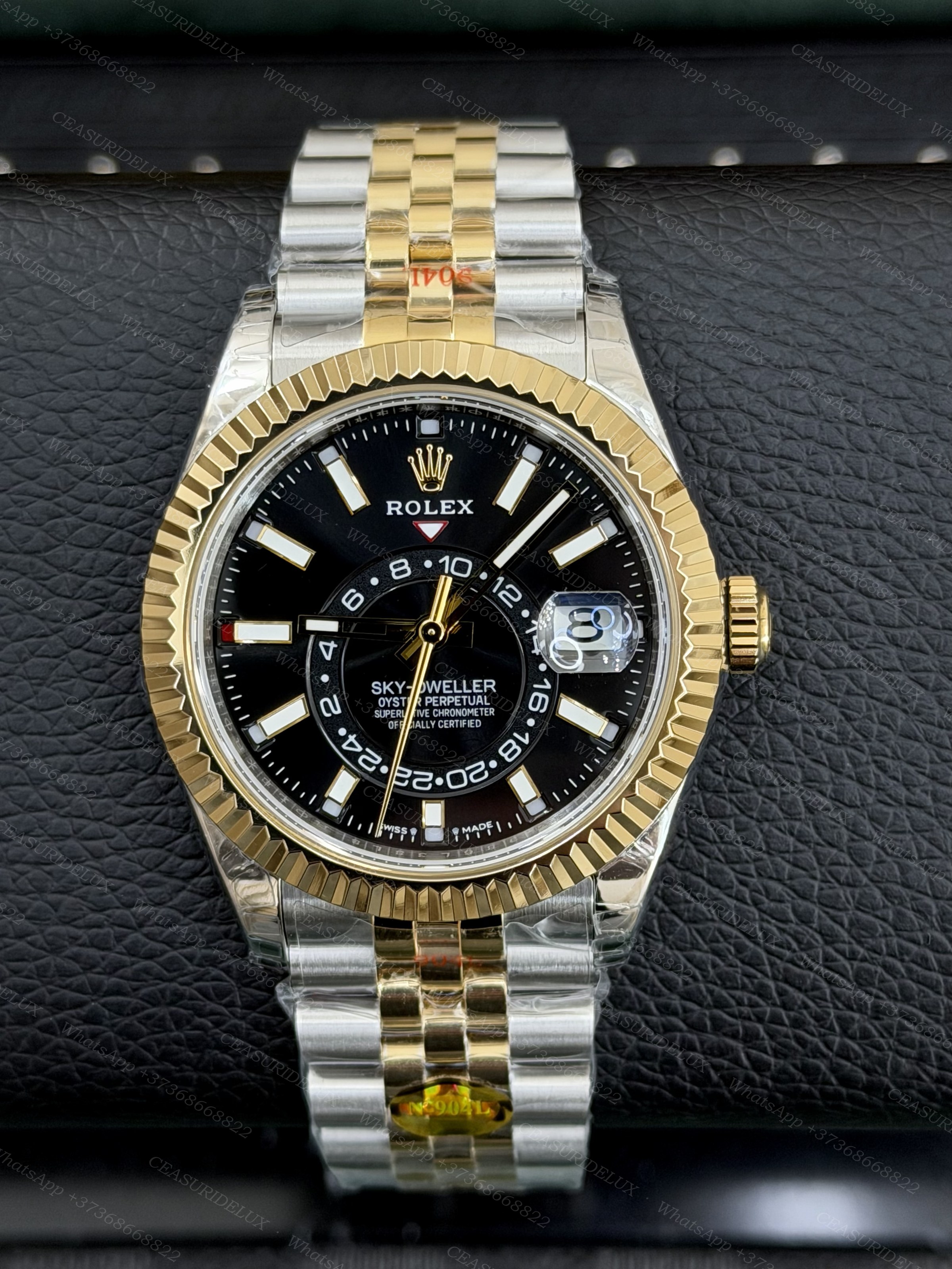 Rolex Sky-Dweller Two-Tone Steel + Yellow Gold — Black Dial + Jubilee (326933) Background