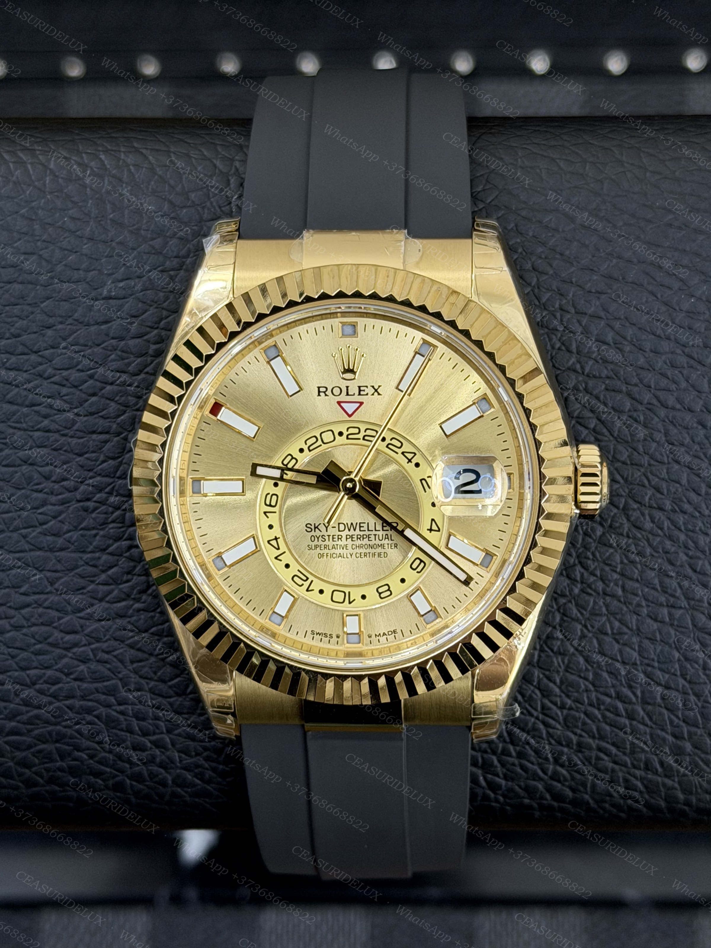 Rolex Sky-Dweller Yellow Gold — Champagne Dial + Oysterflex (326238) Background
