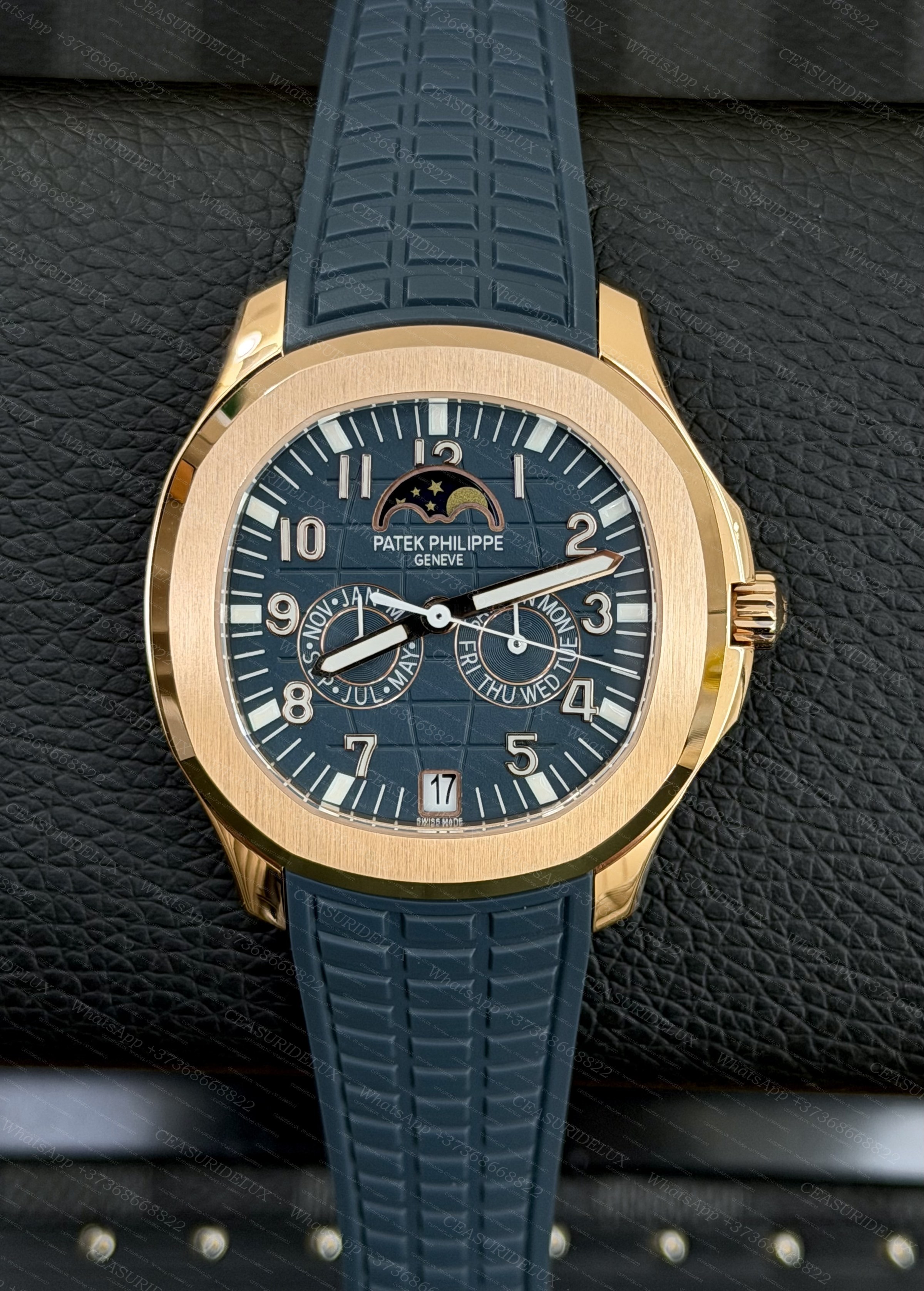 Patek Philippe Aquanaut Travel Time 5261R Rose Gold — Blue Embossed Dial + Composite Strap (5261R-001) Background