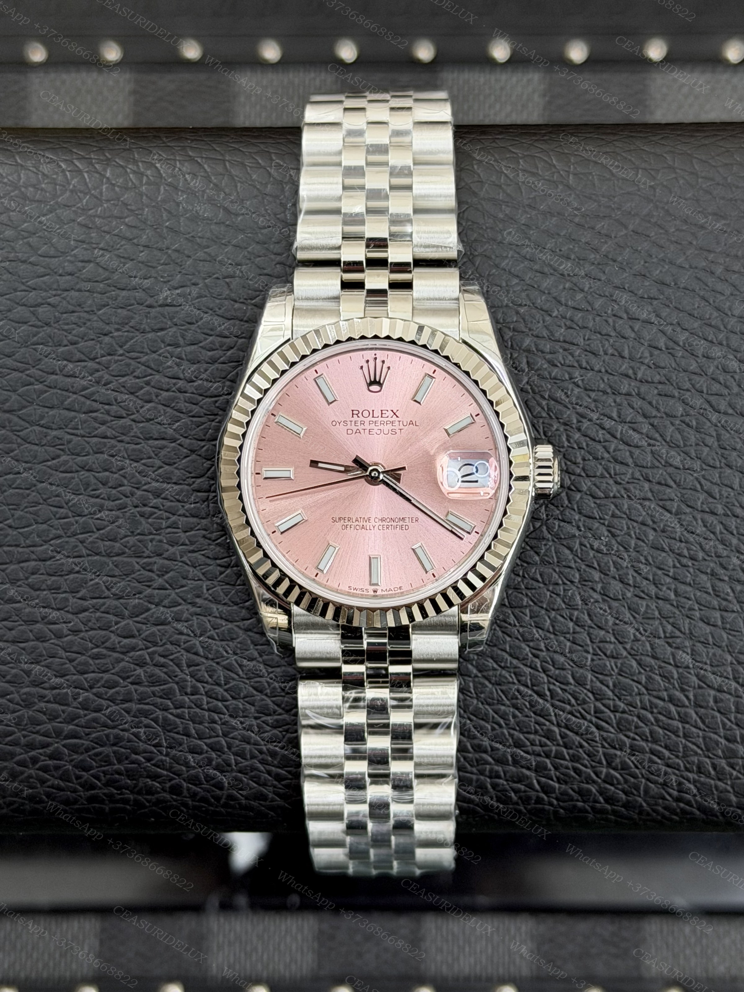 Rolex Date-Just 31 Pink Dial – Ref. 278274 Background