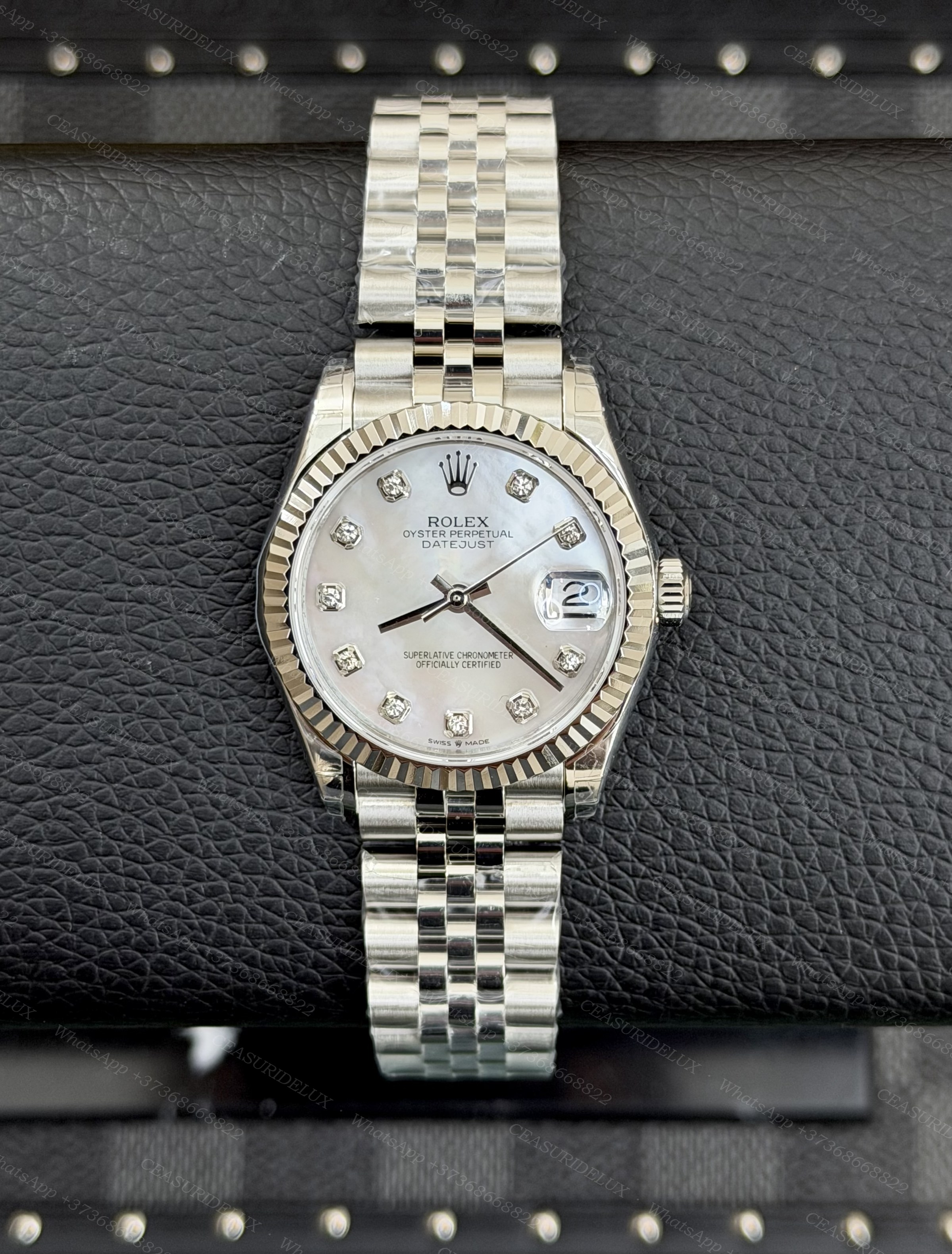 Rolex Date-Just 31 White Mother-of-Pearl Diamond Dial – Ref. 278274 Background