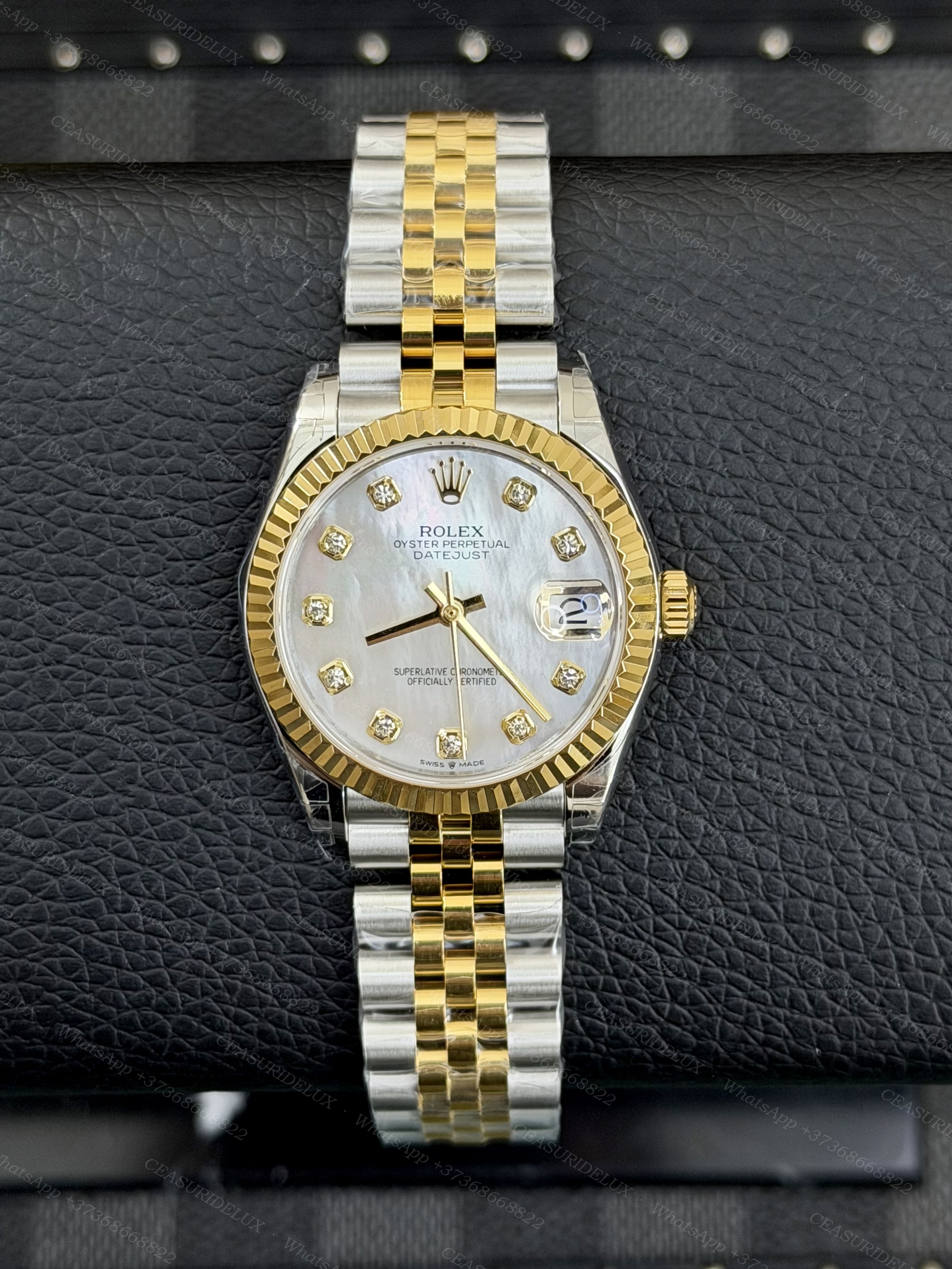 Rolex Date-Just 31 Yellow Rolesor White Mother-of-Pearl Diamond Dial – Ref. 278273 Background