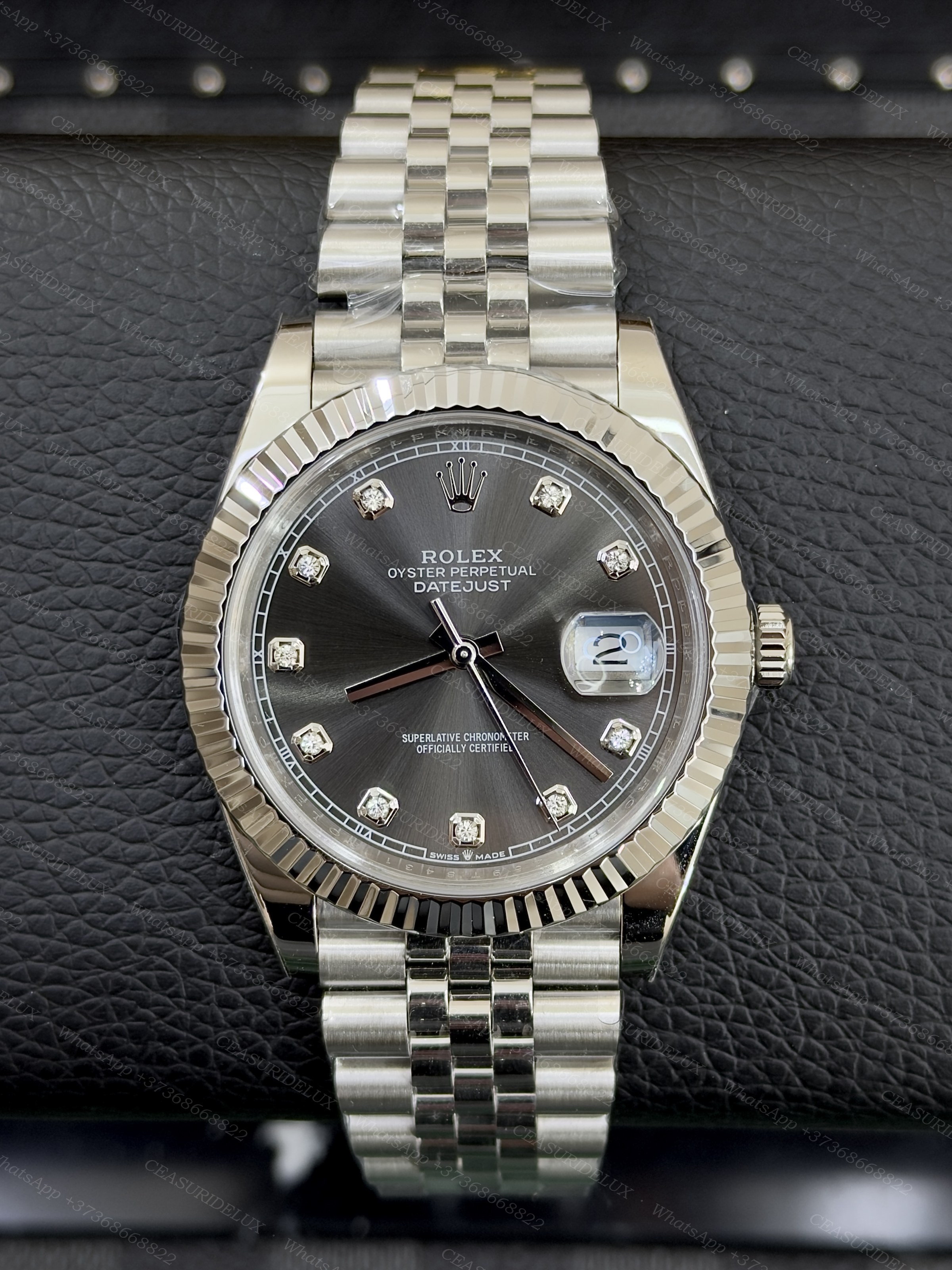 Rolex Rolex Datejust 41mm Stainless Steel & White Gold, Dark Rhodium Diamond Dial, Fluted Bezel, Jubilee Bracelet – Ref. 126334. Background