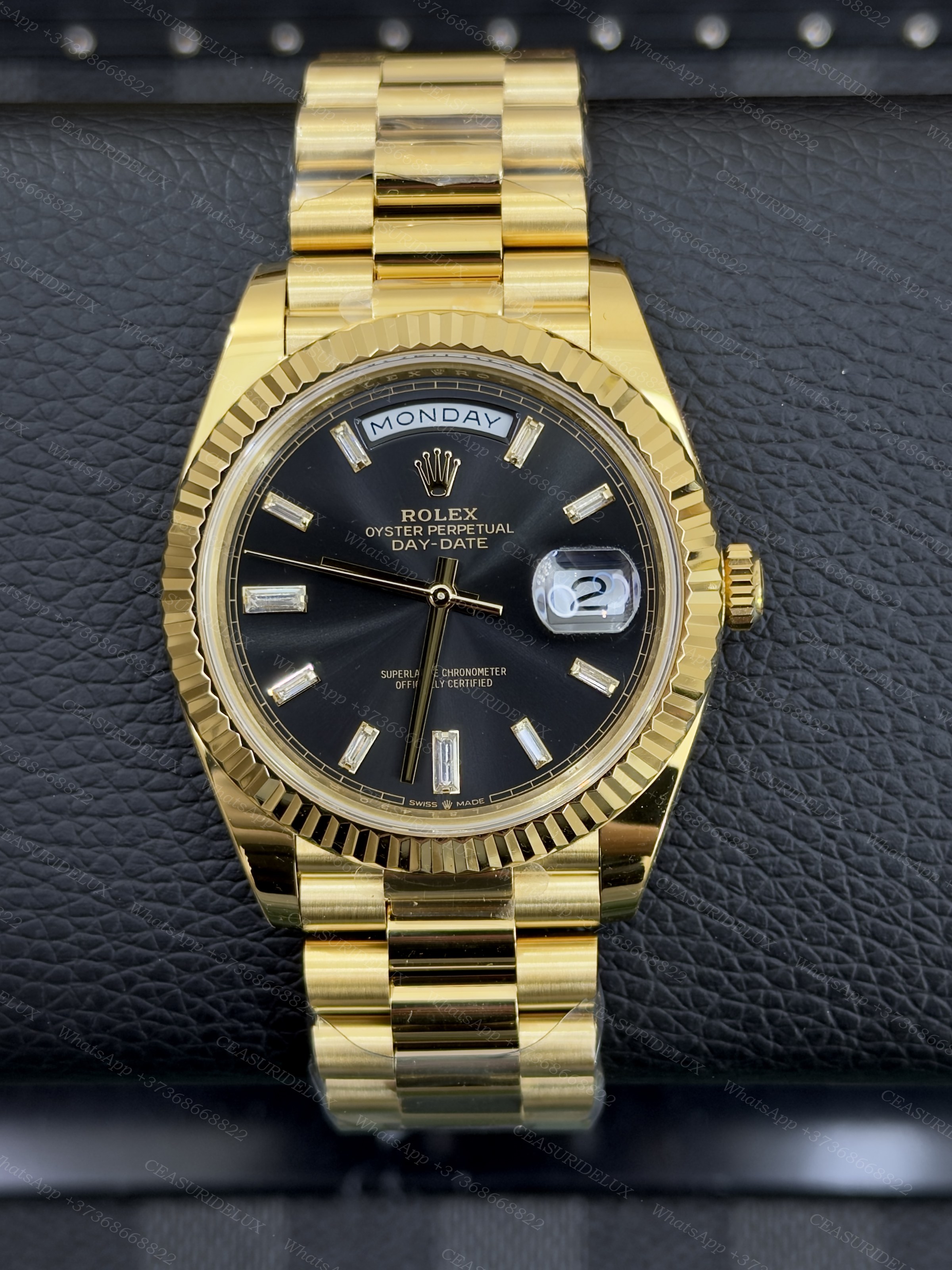Rolex Rolex Day-Date 40 Yellow Gold, Black Baguette Diamond Dial – 228238 Background