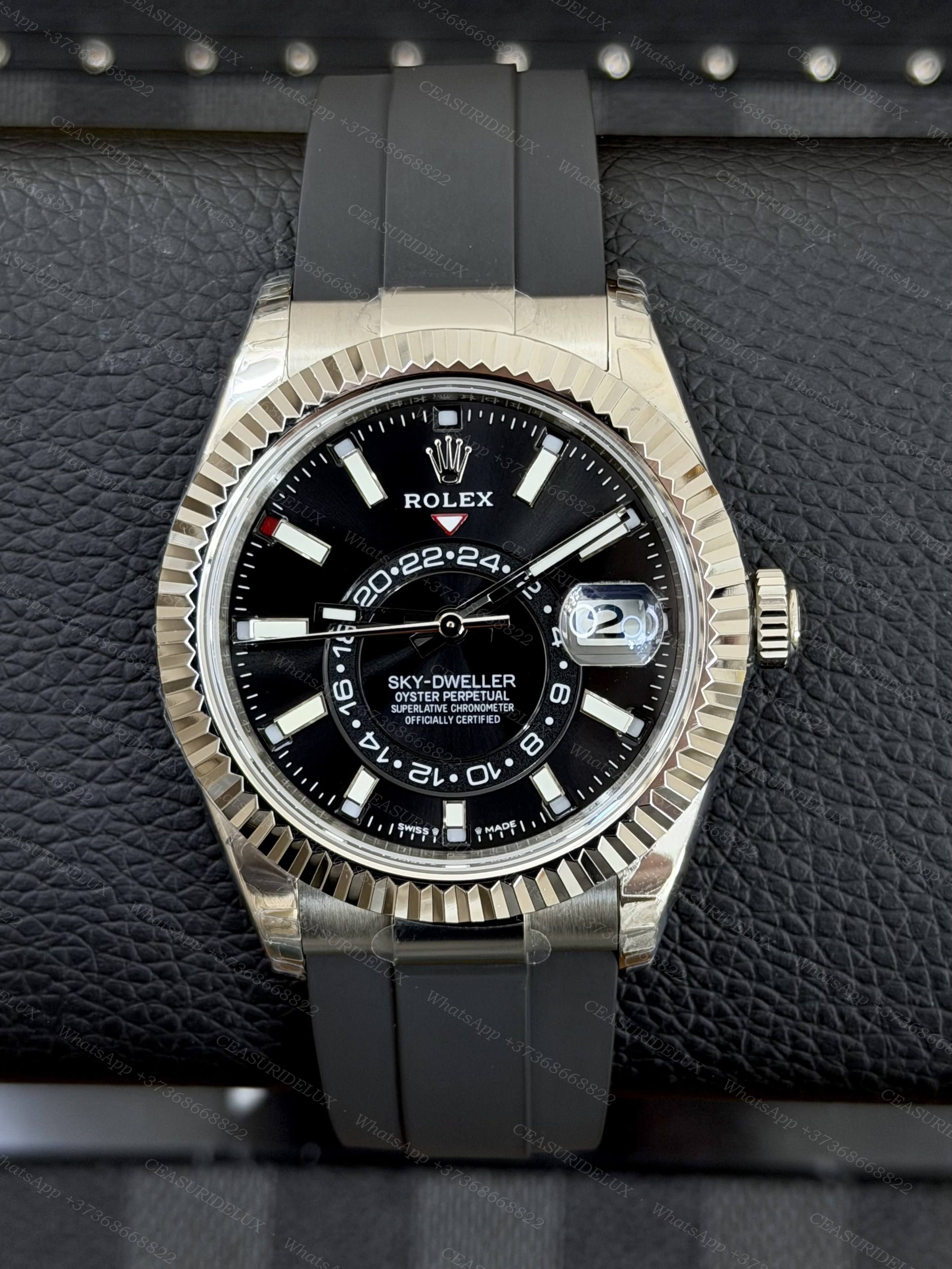 Rolex Rolex Oyster Perpetual Sky-Dweller 42 mm – 18 ct White Gold – Bright Black Dial – Oysterflex Bracelet Background